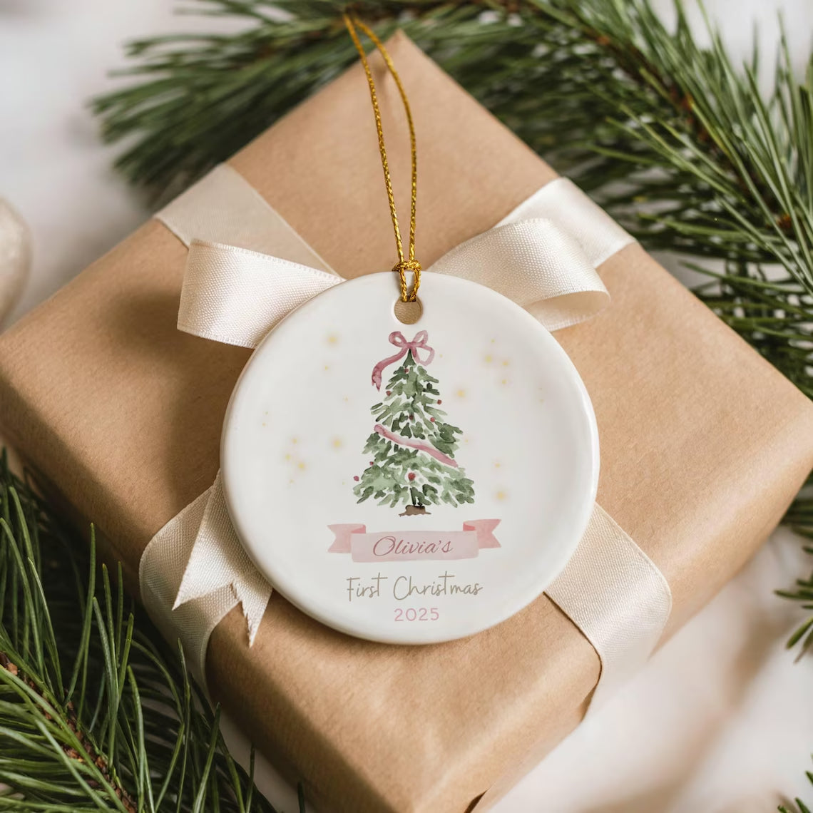 Baby’s First Christmas Ornament 2025 | Pink or Blue Bow Ceramic Keepsake